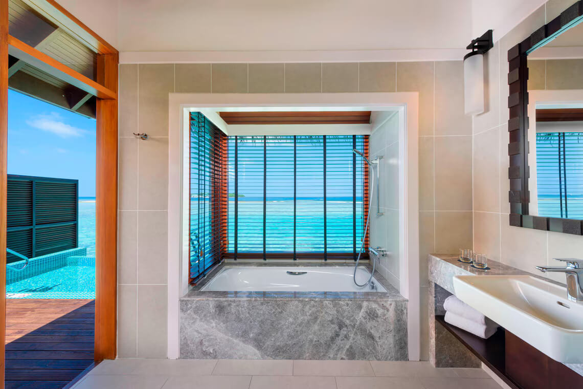 sheraton maldives full moon resort overwater villa with pool bathroom